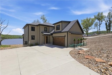 New Construction with Dock! Spectacular Views from the covered - photo 2