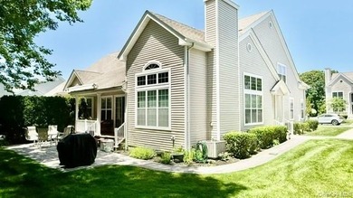 Luxurious And Sought After End Unit Condominium in The Gated 55+ - photo 9