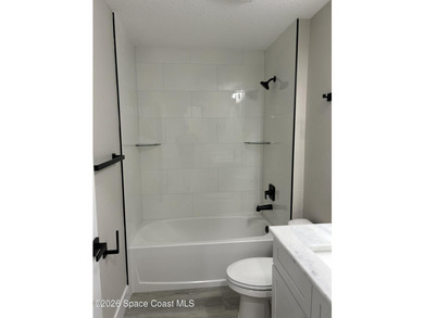 Luxury meets functionality in this exceptional new construction - photo 11