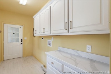 Exceptional home nestled on over one acre within the exclusive - photo 13