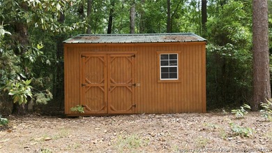 Exceptional home nestled on over one acre within the exclusive - photo 49