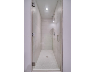 Experience breathtaking Biscayne Bay views from this 2 bed + den