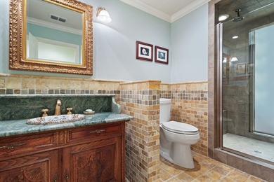 Nestled on two rare waterfront lots in a serene cul-de-sac, this - photo 16