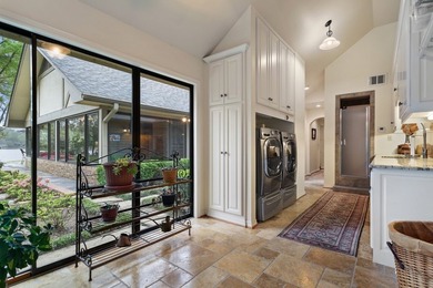Nestled on two rare waterfront lots in a serene cul-de-sac, this - photo 17
