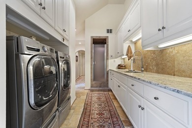 Nestled on two rare waterfront lots in a serene cul-de-sac, this - photo 18
