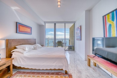 Experience breathtaking Biscayne Bay views from this 2 bed + den