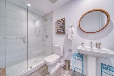 Experience breathtaking Biscayne Bay views from this 2 bed + den