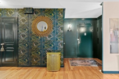 This fully renovated 1,100 sq ft Riviera Towers 1-bedroom