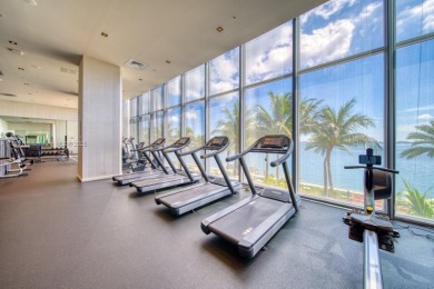 Experience breathtaking Biscayne Bay views from this 2 bed + den