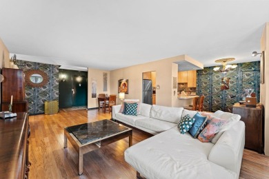 This fully renovated 1,100 sq ft Riviera Towers 1-bedroom