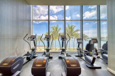 Experience breathtaking Biscayne Bay views from this 2 bed + den