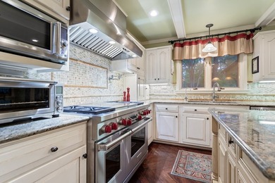 Nestled on two rare waterfront lots in a serene cul-de-sac, this - photo 31