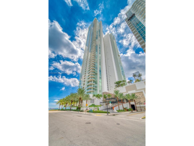 Experience breathtaking Biscayne Bay views from this 2 bed + den