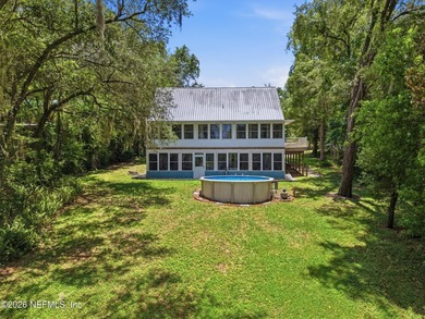 Bright and open living concept in this spacious lake home! The - photo 33