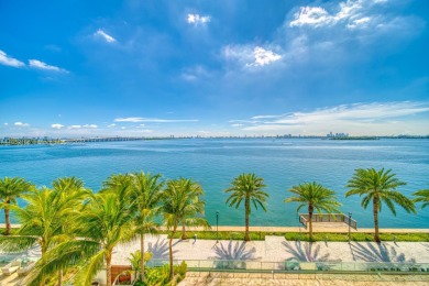 Experience breathtaking Biscayne Bay views from this 2 bed + den