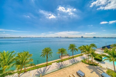 Experience breathtaking Biscayne Bay views from this 2 bed + den