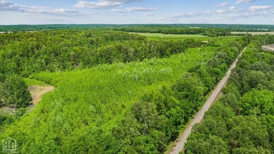 67.78 acres located on paved county road 114 just outside of the - photo 4