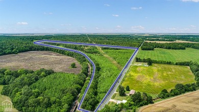 67.78 acres located on paved county road 114 just outside of the - photo 9