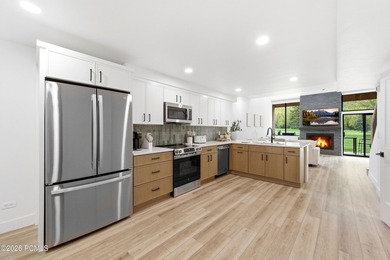 This stunning 4-bedroom, 2.5-bath end-unit residence in the Park - photo 12