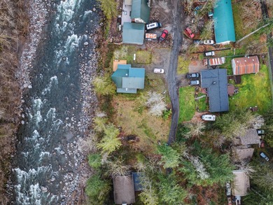 Experience true riverfront living with this rare, build-ready - photo 8