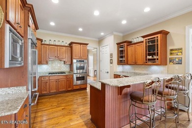 Experience luxury lakefront living in the prestigious gated - photo 22