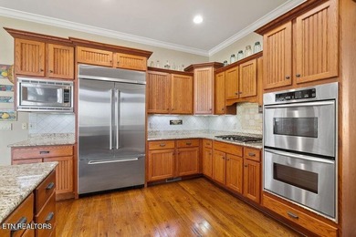 Experience luxury lakefront living in the prestigious gated - photo 23