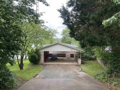 Charming 4-bedroom, 3-bathroom home with 1,598 sqft of living - Lake Home For Sale in Santa Claus, Indiana