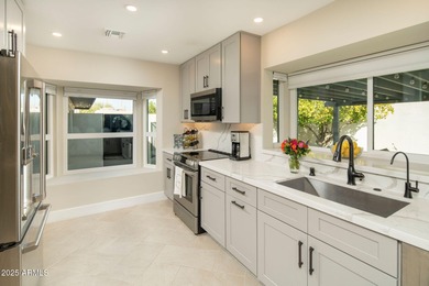 Nestled on a quiet interior lot, this home perfectly balances - photo 5