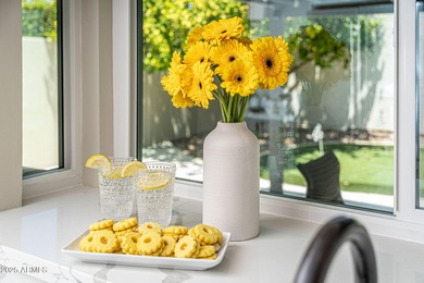 Nestled on a quiet interior lot, this home perfectly balances - photo 7