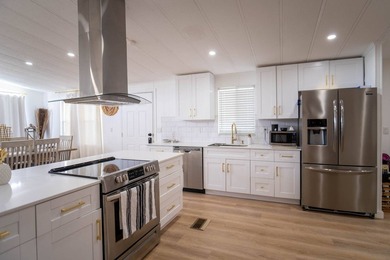 CHEVY EQIUNOX INCLUDED-Refined Renovation in Vibrant Naples - photo 5