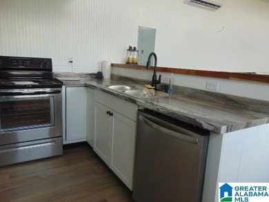 Lakefront Tiny Home with Stunning Views! Step into this charming - photo 4