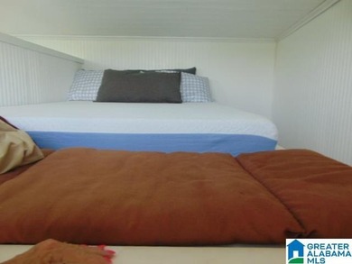 Lakefront Tiny Home with Stunning Views! Step into this charming - photo 6