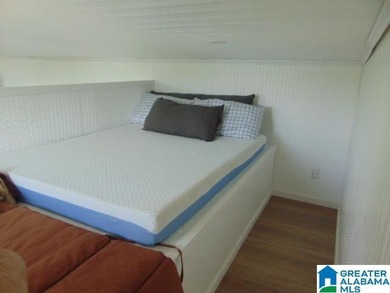 Lakefront Tiny Home with Stunning Views! Step into this charming - photo 7