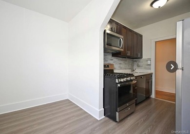 Opportunity is knocking with this legal 8-family Tudor in the - photo 8