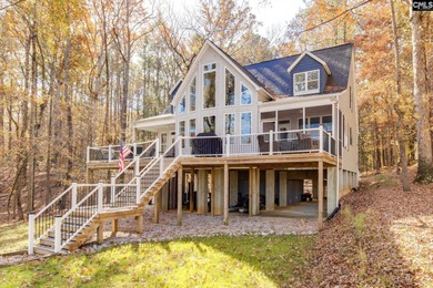 REDUCED! Beautiful Lake front home on a 1.83-acre wooded lot. - photo 3