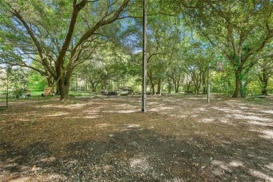 Situated on 2.09 acres off of Historic Bayou Road, one of the - photo 15