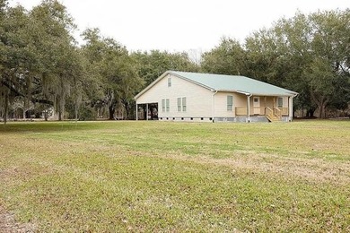 Situated on 2.09 acres off of Historic Bayou Road, one of the - photo 20