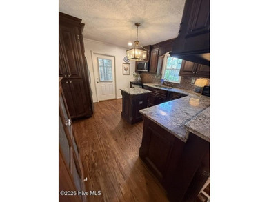 Welcome home to this beautiful 3-bedroom, 2-bath brick residence - photo 11