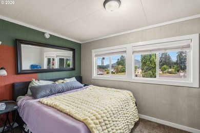 Gorgeous lake and mountain views from this cozy and affordable - photo 7