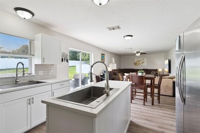 Virtually Staged. Experience elevated living in the gated - photo 11