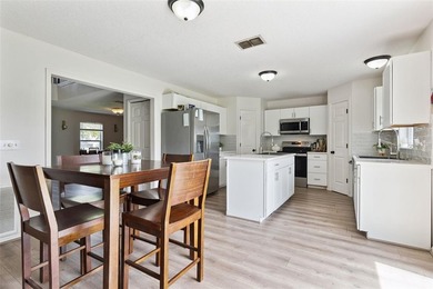 Virtually Staged. Experience elevated living in the gated - photo 12