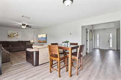 Virtually Staged. Experience elevated living in the gated - photo 14