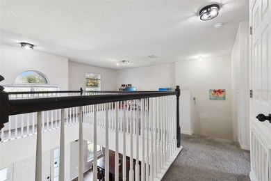 Virtually Staged. Experience elevated living in the gated - photo 21