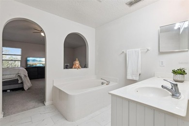 Virtually Staged. Experience elevated living in the gated - photo 26