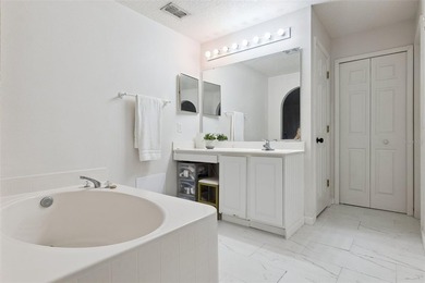 Virtually Staged. Experience elevated living in the gated - photo 27