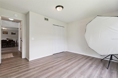 Virtually Staged. Experience elevated living in the gated - photo 35