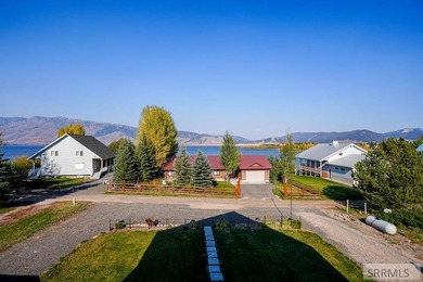 THIS HOME IS IN A HENRYS LAKE COMMUNITY WITH MARINA FOR USE BY - photo 12
