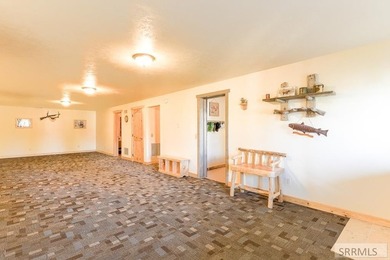 THIS HOME IS IN A HENRYS LAKE COMMUNITY WITH MARINA FOR USE BY - photo 14