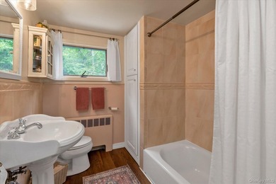 Welcome to this mint-condition Cape Cod nestled on a quiet - photo 15