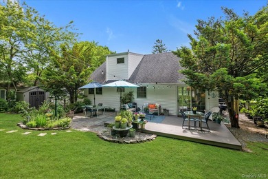 Welcome to this mint-condition Cape Cod nestled on a quiet - photo 17
